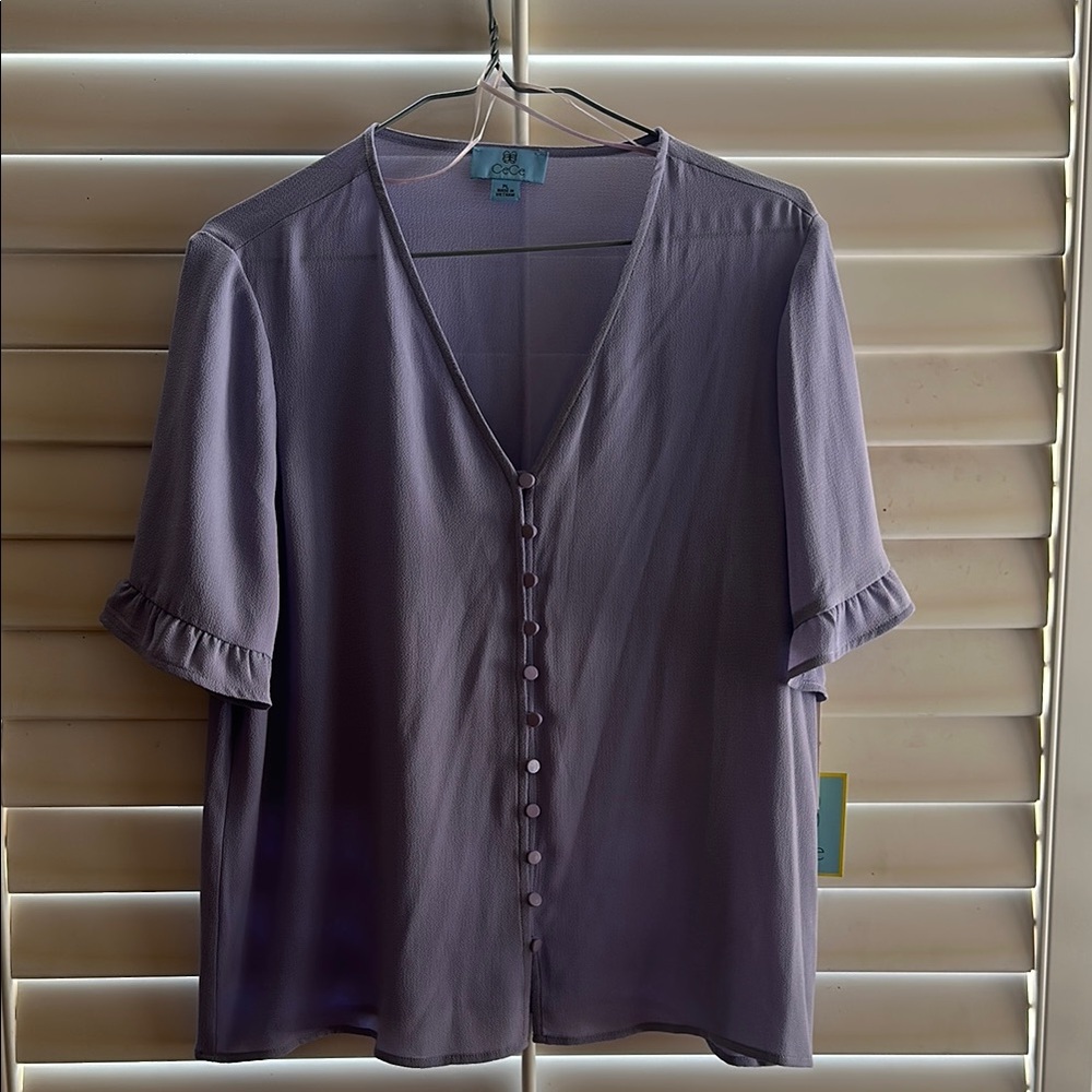 NWT Cece periwinkle top with ruffle sleeve details.  Size petite large.